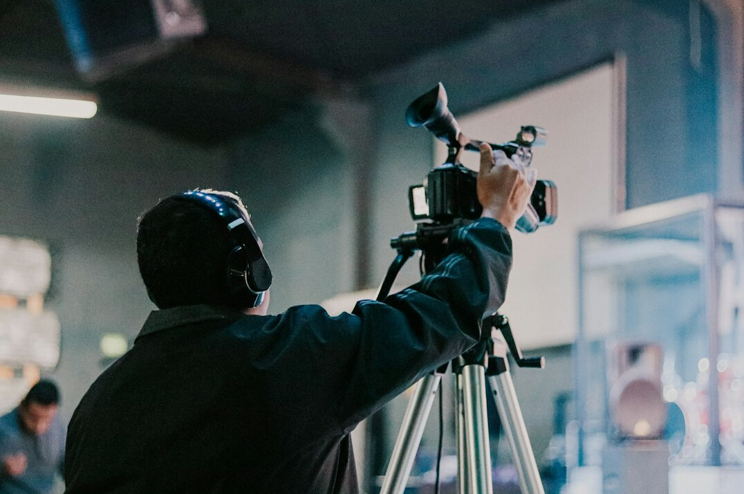 filmmaker reviewing footage