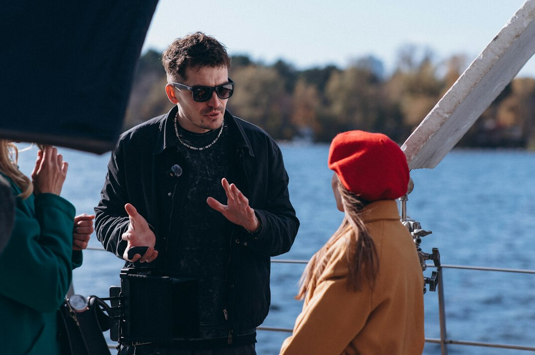 director directing actors on film set